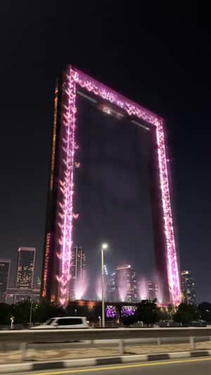 Giant Pink Frame With Butterflies in a fake-out-of-home ad of Victoria’s Secret