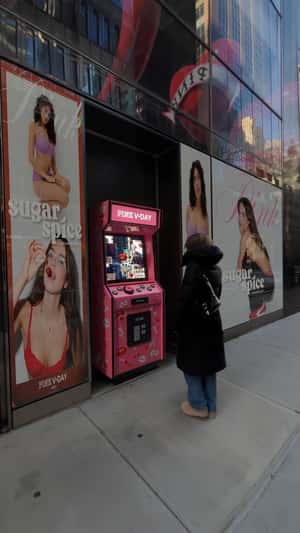Giant Glossy Lips Float in a fake-out-of-home ad of Victoria’s Secret PINK 