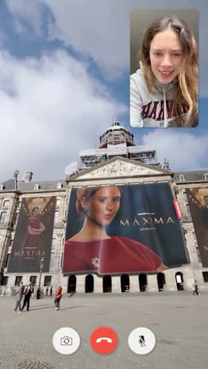 Giant Máxima Banner in Dam Square in a fake-out-of-home ad of Videoland