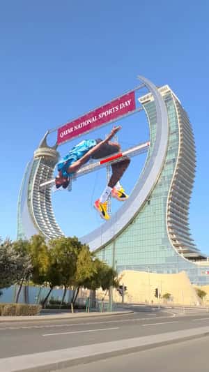 Mutaz Barshim High Jump in Katara Towers in a fake-out-of-home ad of Visit Qatar