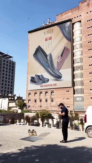 Loafers Float in Middle Eastern Plaza in a fake-out-of-home ad of Vogue Store