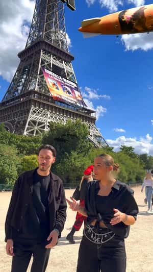 Godzilla X Kong Blimps Over Eiffel Tower in a fake-out-of-home ad of Warner Bros