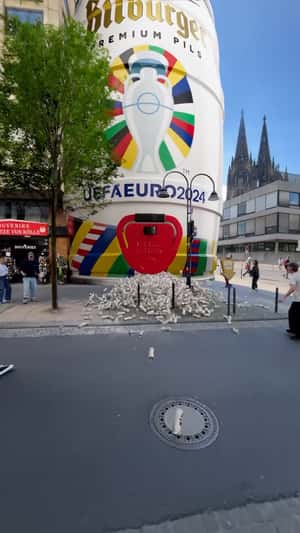 Giant Special Edition Can in fake-out-of-home ad of Bitburger
