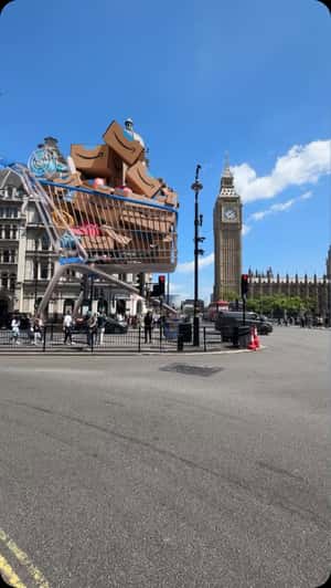 Giant Shopping Cart Rolls Through London in a fake-out-of-home ad of Amazon