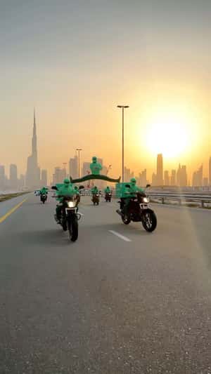 Epic Split Motorcycle Stunt in Dubai Highway in a fake-out-of-home ad of Careem