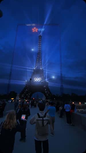 Giant Holographic Display Frames Eiffel Tower in a fake-out-of-home ad of EDF Spport