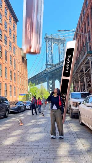 Oversized lip balm in Manhattan fake out of home ad of Lancôme