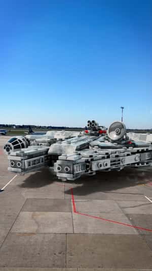 Millennium Falcon at Warsaw Chopin Airport in a fake-out-of-home ad of LEGO