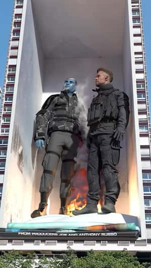 Zlu And Chris Hemsworth From Extraction 2 Billboard in a fake-out-of-home ad of Netflix