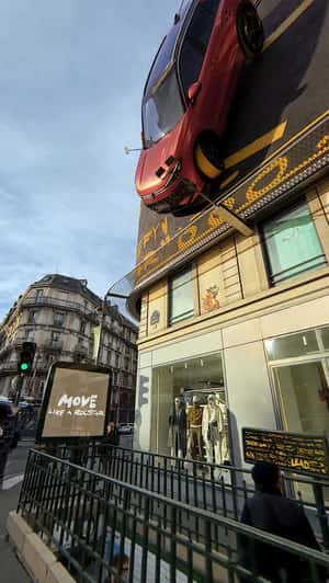 "T-Roc" Cars on Building Facade in a fake-out-of-home of Volkswagen 