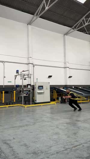 Man Pulls Truck Carrying Giant Handbag in a fake-out-of-home ad of Nude Project 