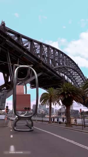 Giant Flip Phones as Newton's Cradle in a fake-out-of-home ad of Samsung