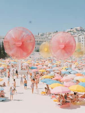 Fans Towering at the Beach in a fake-out-of-home ad of Morris