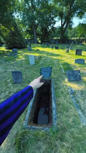 Man Fell into the Grave in a fake-out-of-home ad of Netflix