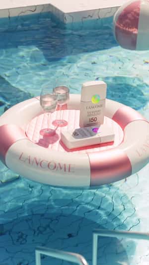 Sunbathing Sunscreens in a fake-out-of-home ad of Lancôme