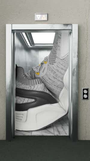 Giant Trainer Shoe in fake-out-of-home ad of Pull&Bear
