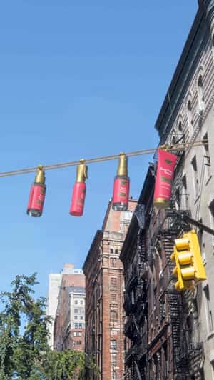 Haircare Products Glides on the Rope in a fake-out-of-home ad of OGX Beauty