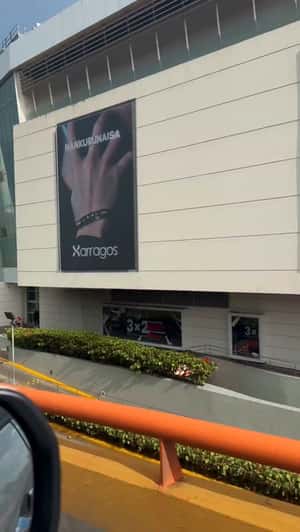 Bracelet Emerges from Mall Billboard in a fake-out-of-home ad of Xarragos