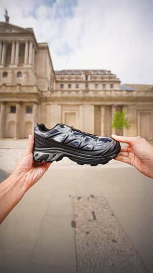 Dioramas Inside Running Shoe in a fake-out-of-home ad of Foot Locker