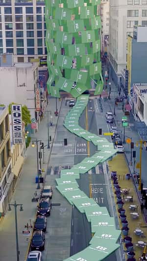 Green Gift Cards Domino Effect in fake-out-of-home ad of Pull&Bear