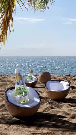 Coconut Reveals Oil Bottle in a fake-out-of-home ad of OGX Beauty