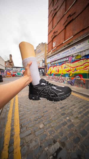 Prosthetic Leg Pulled from Portal in a fake-out-of-home ad of Foot Locker