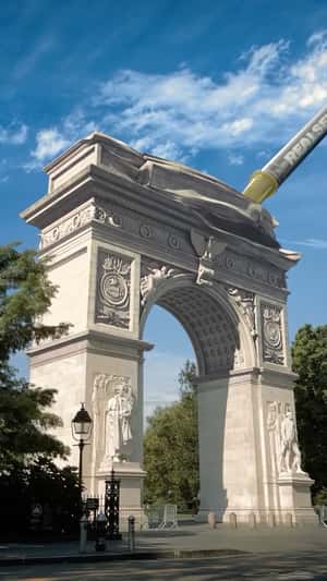 Syringe Inflates Monument Arch in a fake-out-of-home ad of RealSelf