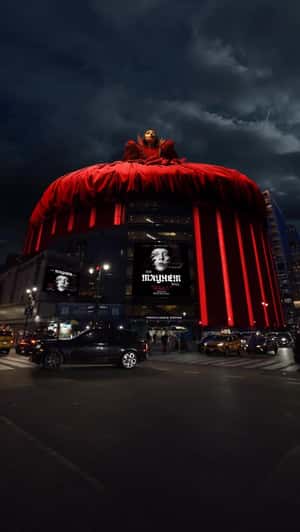 Lady Gaga Poses on Top of Arena in a fake-out-of-home ad of Madison Square Garden