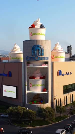 Ice Cream Cup on Flamingo Floater in a fake-out-of-home ad of Pinkberry