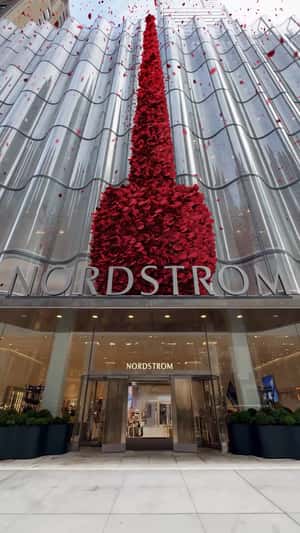 Rose Petals Create Perfume Bottle in a fake-out-of-home ad of Nordstrom