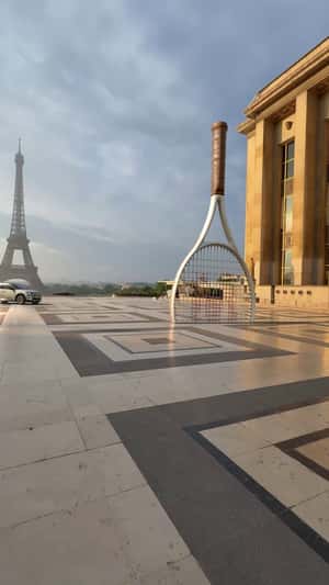 Car Passes Through Tennis Racket in a fake-out-of-home ad of Renault
