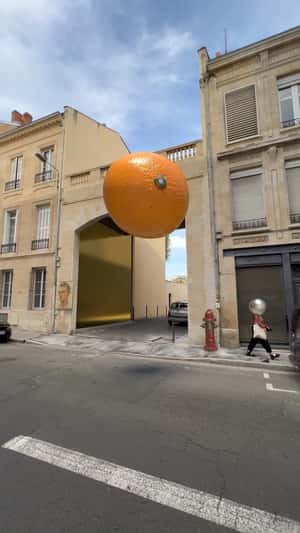 Orange Transformation in the Street in fake-out-of-home ad of Lenovo