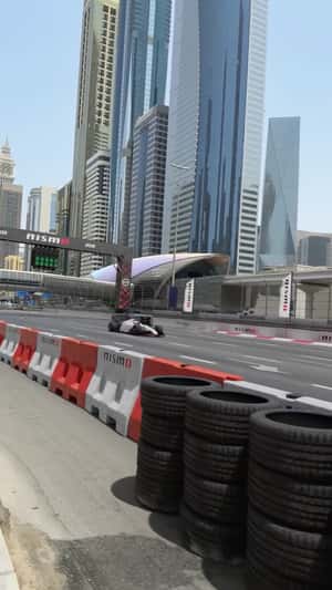 SUV Races with F1 Car in a fake-out-of-home ad of Nissan