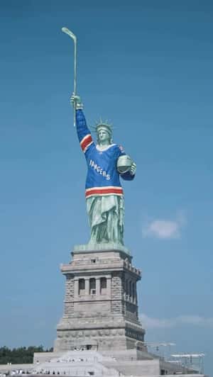 Lady Liberty Wears Hockey Jersey in a fake-out-of-home ad of New York Rangers