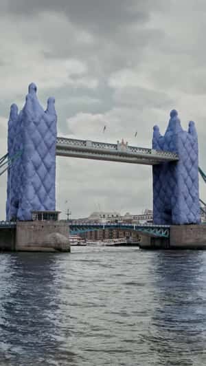 Tower Bridge Wears Waterproof Fabric in a fake-out-of-home ad of Uniqlo