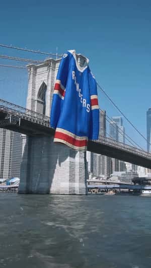 Giant Jersey on Brooklyn Bridge in a fake-out-of-home of NY Rangers