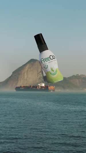 Massive Bottle in Sugarloaf Mountain in a fake-out-of-home ad of FreeCô