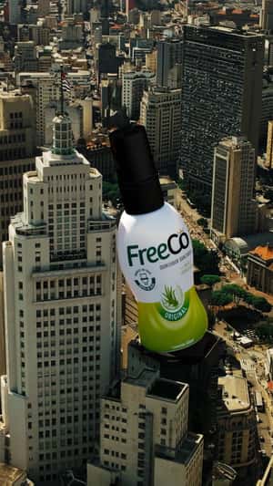 Giant Bottle in Edificio Martinelli in a fake-out-of-home ad of FreeCô
