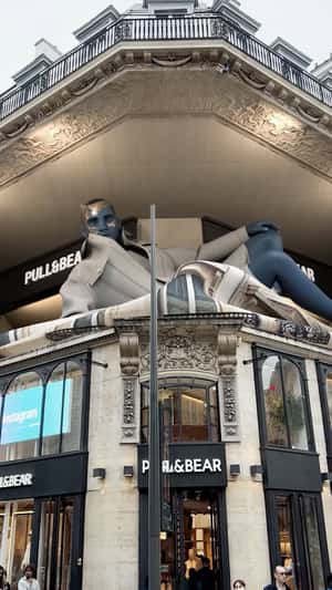 Blue Man Display at Store in fake-out-of-home ad of Pull&Bear