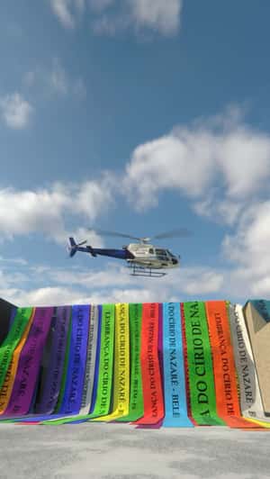 Helicopter Reveals Hospital Beneath Ribbons in a fake-out-of-home ad of Hapvida