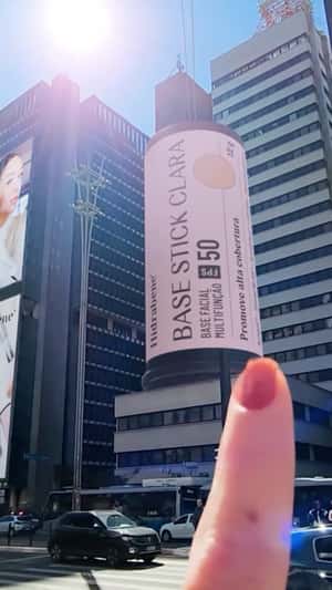 Giant Base Stick on Building in a fake-out-of-home ad of Hidrabene Derma