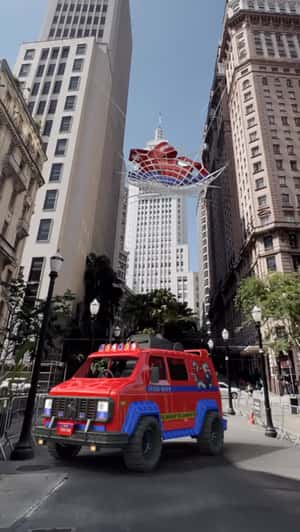 Giant Spider-Man Sandal on Spider Web in a fake-out-of-home ad of Grendene
