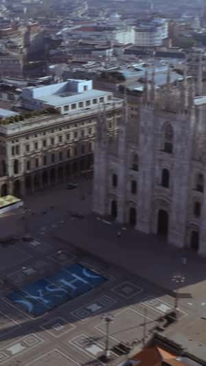 Banners at Duomo di Milano in a fake-out-of-home ad of Oysho