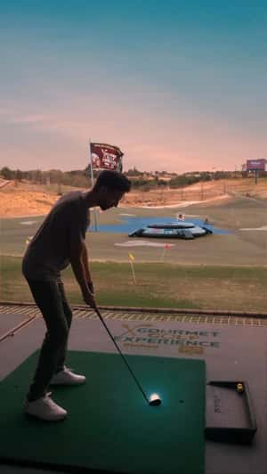 Giant Beer in Golf Course in a fake-out-of-home ad of Gourmet Golf Experience