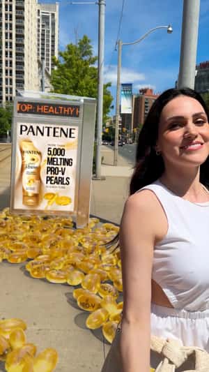 Pro-V Pearls Flowing Out From Tram fake out of home ad of Pantene