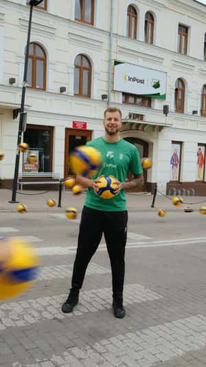Volleyballs Bounce Through Streets in a fake-out-of-home ad of InPost CHKS Chełm