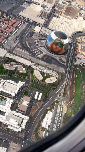 Giant Golden Installation in Las Vegas Sphere in a fake-out-of-home ad of SLS
