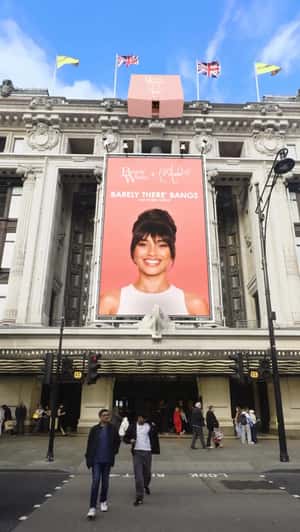 Woman In Billboard Gets Bangs in a fake-out-of-home af of Beauty Works