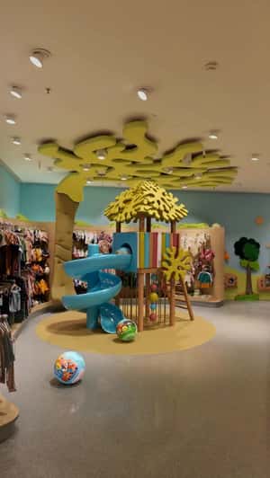 Play Area in Store in a fake-out-of-home ad of DM
