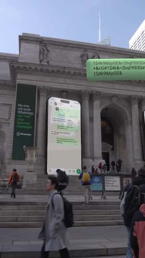 Giant Phones on NYC Public Library in a fake-out-of-home ad of WhatsApp